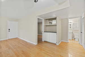 Unfurnished living room with light hardwood / wood-style flooring