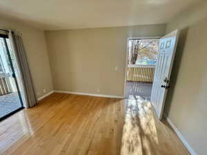 Spare room featuring light wood-type flooring