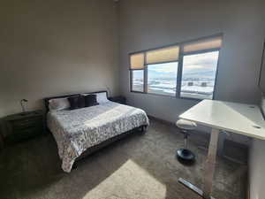 View of main floor, carpeted bedroom