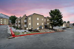 Exterior space featuring cooling unit and a mountain view