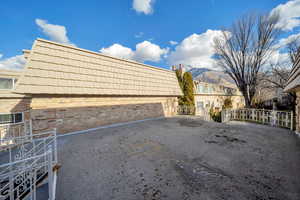 View of property exterior with a mountain view