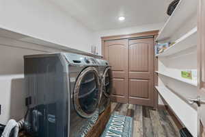 Laundry room with storage.