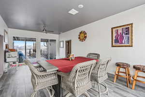 Dining room, adjacent to kitchen with mountain views to the west and lake views to the east and walkout to deck.