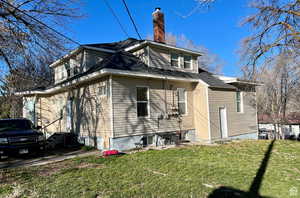 View of home's exterior featuring a yard