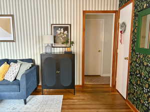 Living area featuring hardwood / wood-style floors