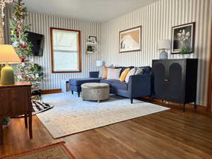 Living room featuring hardwood / wood-style flooring