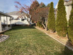 View of yard featuring cooling unit