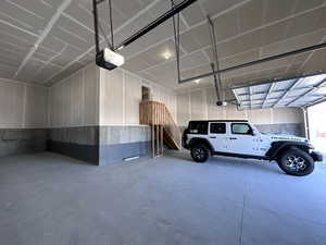 4 car Garage with a garage door openers