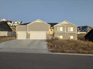 View of front of home featuring a garage