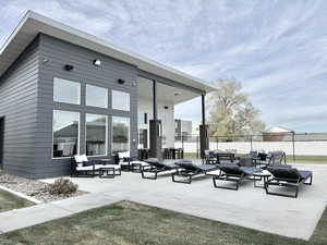 View of patio featuring an outdoor hangout area