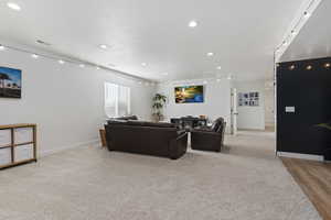 Living room with light carpet