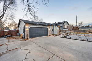 View of front of home featuring a garage