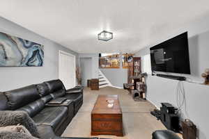 Living room with a textured ceiling