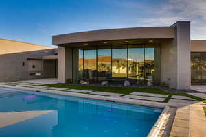 Back of house with a patio area