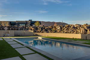 View of swimming pool featuring a mountain view