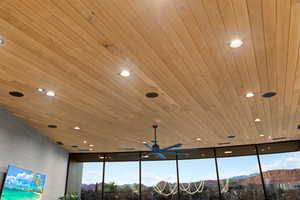 Detailed view of recessed lighting and a ceiling fan
