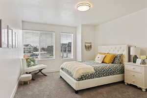 Bedroom featuring carpet flooring