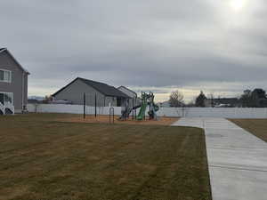 View of yard featuring a playground