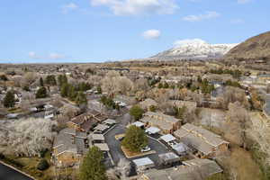 Birds eye view of property with a mountain view