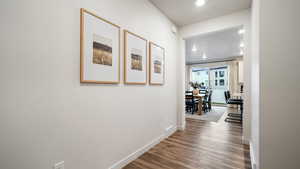 Entryway featuring hardwood / wood-style floors and a textured ceiling