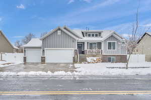 View of front of property with a garage