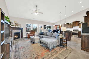 Cozy gas fireplace and large windows overlooking the yard and pasture