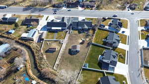 Aerial view of lot and canal on north end of property - fully fenced between lot and canal.