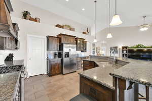 Kitchen is spacious and includes a pantry.