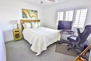 Bedroom with carpet floors and ceiling fan