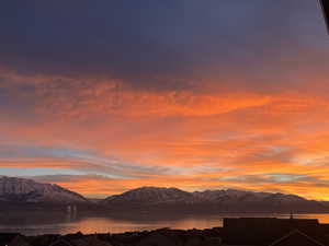View of mountain background featuring a nearby body of water