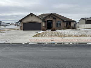 View of front of home with a garage