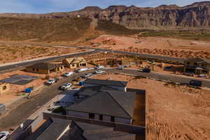 Birds eye view of property with a mountain view