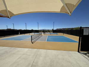 View of sport court featuring a mountain view and basketball court