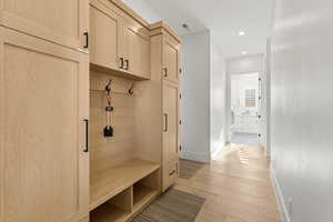 Mudroom featuring light hardwood / wood-style floors