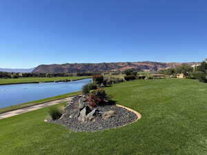 Exterior space featuring a water and mountain view