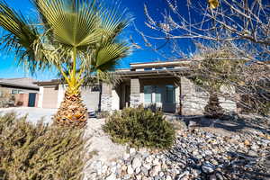 View of front of property featuring a garage