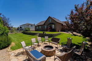 View of patio / terrace featuring a fire pit