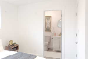 Bedroom featuring ensuite bath