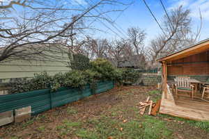 View of yard featuring a deck