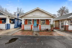 View of front of house with covered porch