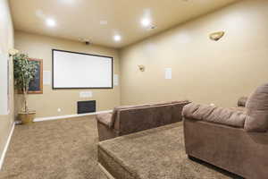 Home theater room with carpet