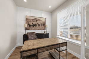 Office space featuring baseboards, dark wood finished floors, and recessed lighting