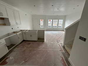 Kitchen with white cabinets