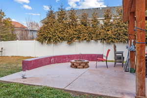 View of patio / terrace with an outdoor fire pit