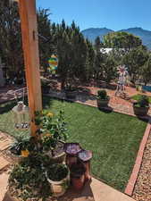 View of yard with a mountain view