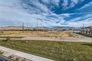 View of yard with a mountain view