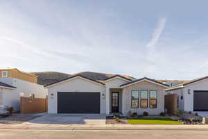 View of front of property with a garage