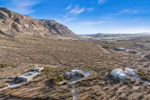 Drone / aerial view featuring a mountain view