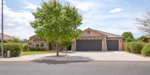 Mediterranean / spanish-style house featuring a garage