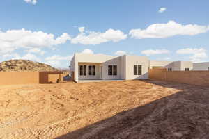 Back of house with a mountain view